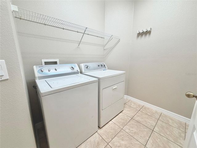 1044 LONGVILLE CIRCLE, Tavares, FL 32778