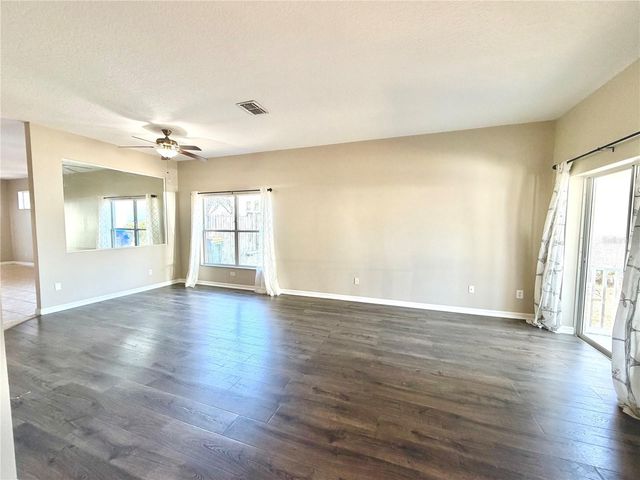 1044 LONGVILLE CIRCLE, Tavares, FL 32778