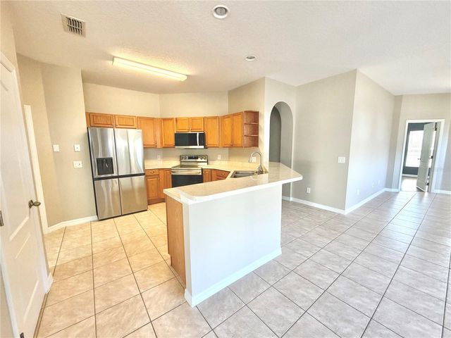 1044 LONGVILLE CIRCLE, Tavares, FL 32778