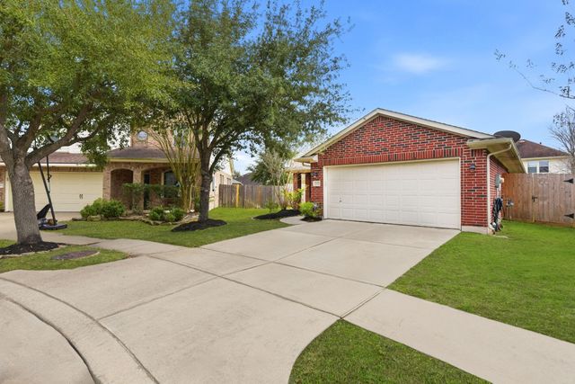31039 Sundance Woods Court, Spring, TX 77386