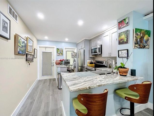 460 Paradise Isle Boulevard 205, Hallandale Beach, FL 33009