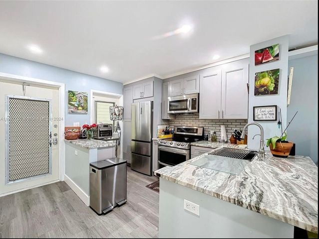 460 Paradise Isle Boulevard 205, Hallandale Beach, FL 33009