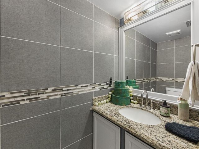 126 Hammocks Court, Greenacres, FL 33413