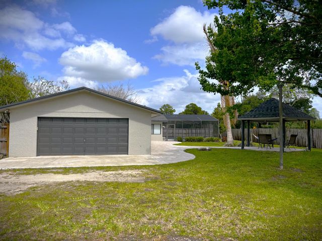 202 SW Crescent Avenue, Port St. Lucie, FL 34984