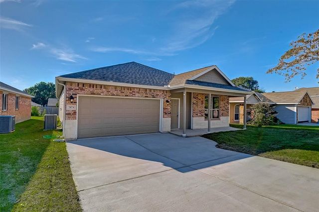 7074 Gentle Breeze Drive, Willis, TX 77318