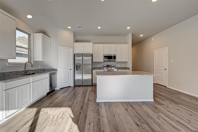 7074 Gentle Breeze Drive, Willis, TX 77318