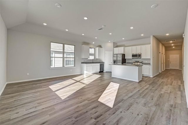7074 Gentle Breeze Drive, Willis, TX 77318