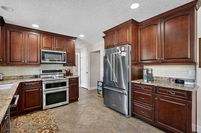 14 VILLAGE DRIVE, Ormond Beach, FL 32174