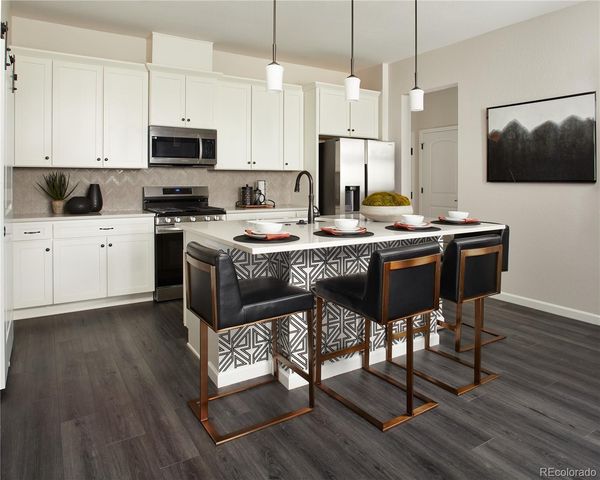 6153 N Ceylon Street 104, Denver, CO 80249