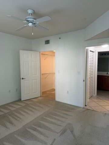 6505 EMERALD DUNES Drive 107, West Palm Beach, FL 33411