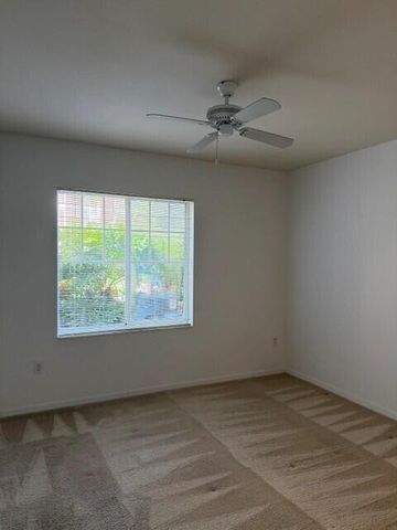 6505 EMERALD DUNES Drive 107, West Palm Beach, FL 33411
