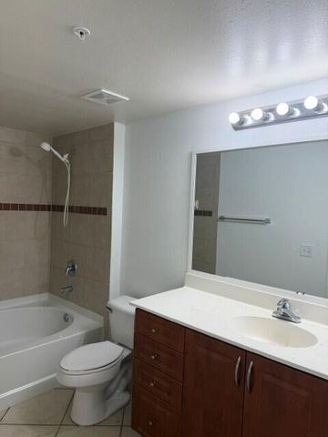 6505 EMERALD DUNES Drive 107, West Palm Beach, FL 33411