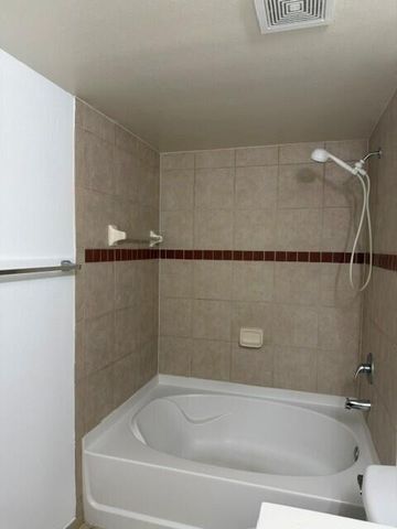 6505 EMERALD DUNES Drive 107, West Palm Beach, FL 33411