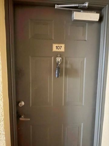 6505 EMERALD DUNES Drive 107, West Palm Beach, FL 33411