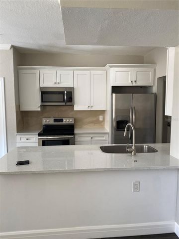 2558 ROBERT TRENT JONES DRIVE 1424, Orlando, FL 32835