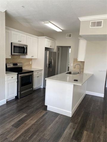 2558 ROBERT TRENT JONES DRIVE 1424, Orlando, FL 32835