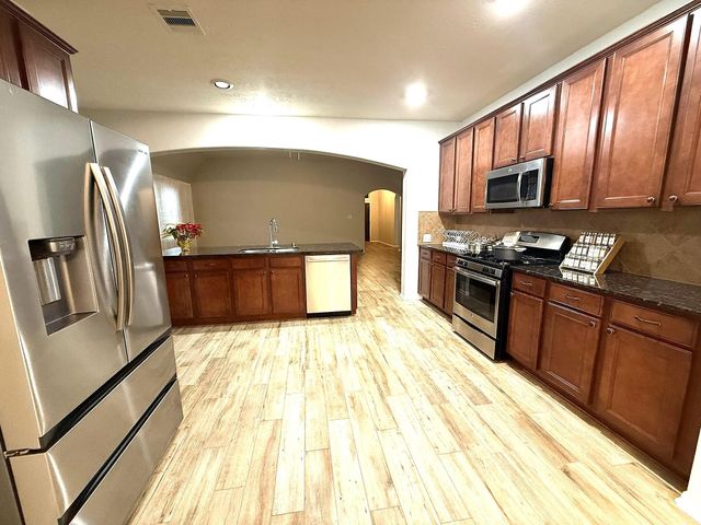 14322 Heath Falls Lane, Cypress, TX 77429