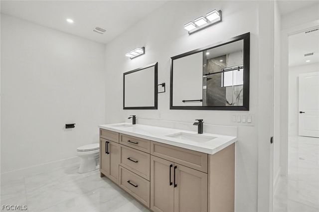 369 Woodburn DR, Lehigh Acres, FL 33972