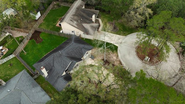 49 Country Forest Court, The Woodlands, TX 77380