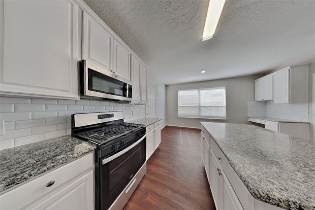 18914 Woodglen Shadows Drive, Humble, TX 77346