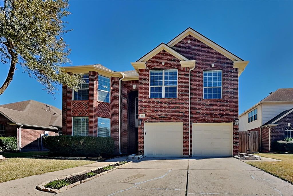 18914 Woodglen Shadows Drive, Humble, TX 77346