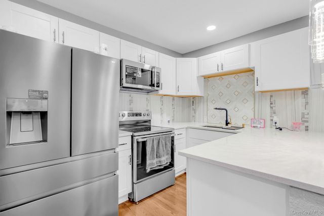 9411 210th Street, Queens Village, NY 11428