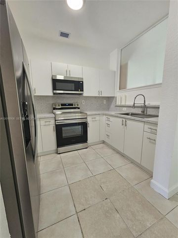 17720 NW 73 203, Hialeah, FL 33015