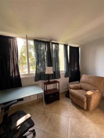 6075 N Sabal Palm Blvd 205, Tamarac, FL 33319