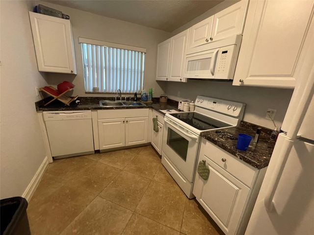 6075 N Sabal Palm Blvd 205, Tamarac, FL 33319