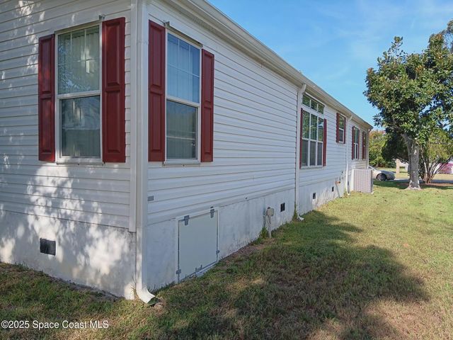 913 Sequoia Street, Barefoot Bay, FL 32976