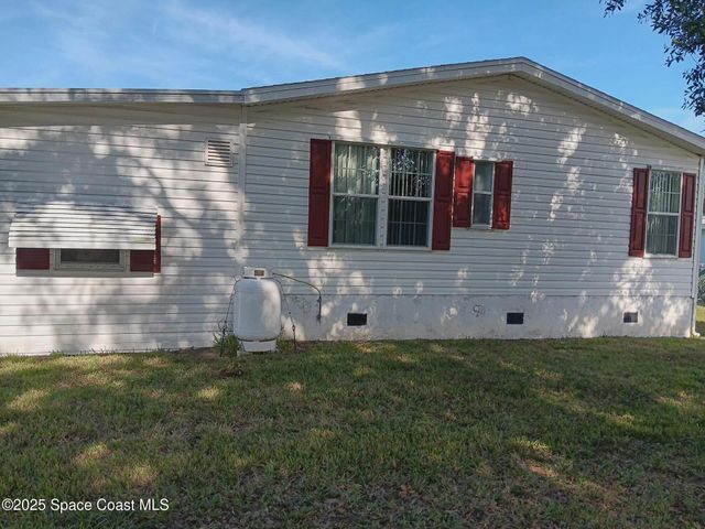 913 Sequoia Street, Barefoot Bay, FL 32976