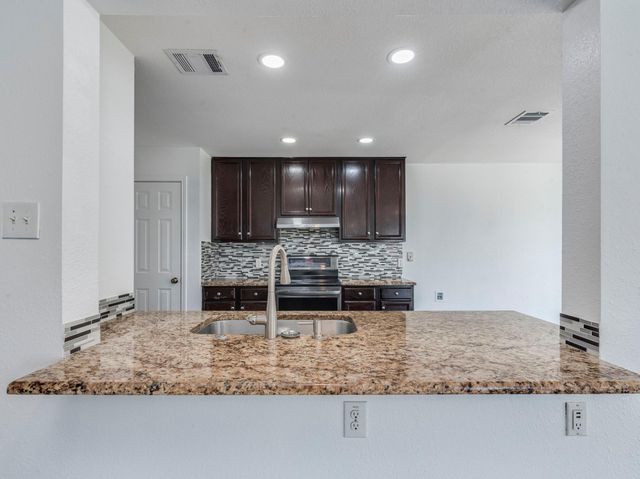 12825 Sexson Ridge CV, Del Valle, TX 78617