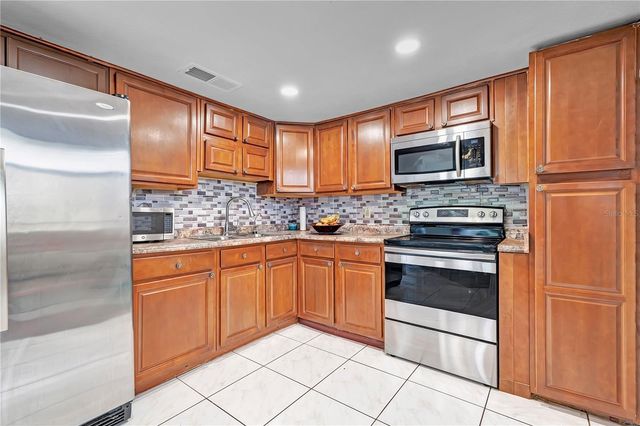 9824 SURREY RIDGE ROAD, Orlando, FL 32825