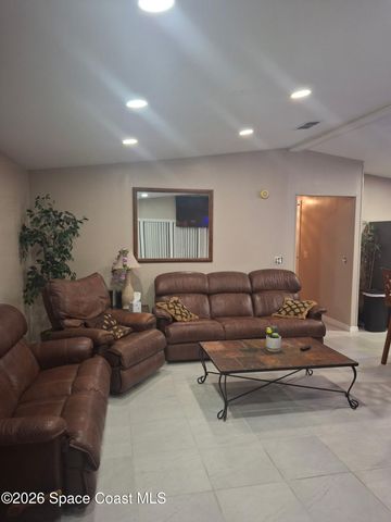 916 Jacaranda Drive, Barefoot Bay, FL 32976