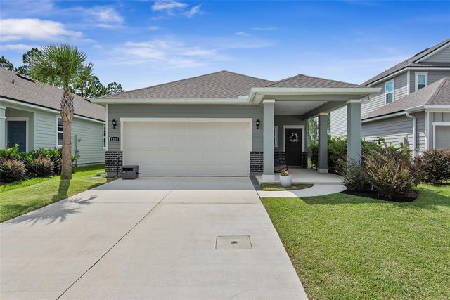 1303 RIBBON PLACE, Palm Coast, FL 32164