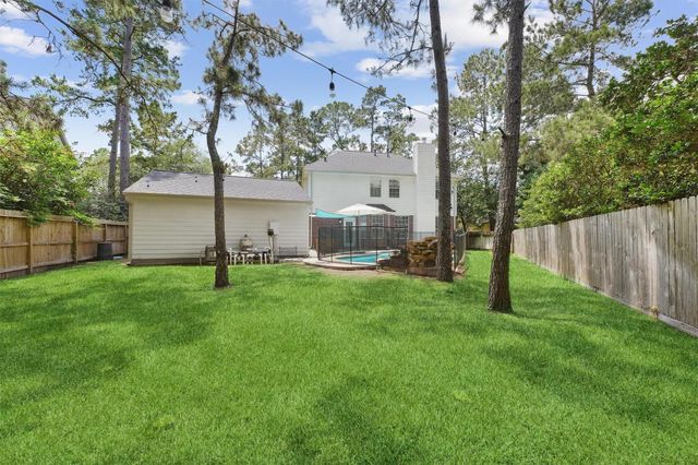 74 W Summer Storm Circle, The Woodlands, TX 77381