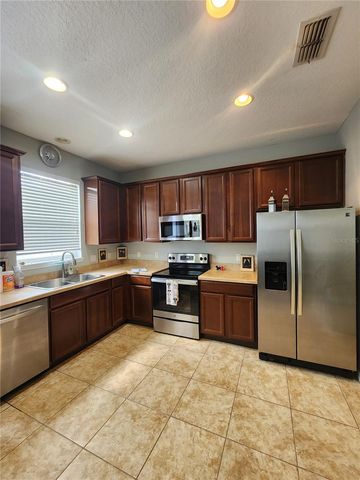 13209 SILVER STRAND FALLS DRIVE, Orlando, FL 32824