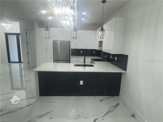 518 HARRY THAYER AVENUE S, Lehigh Acres, FL 33974
