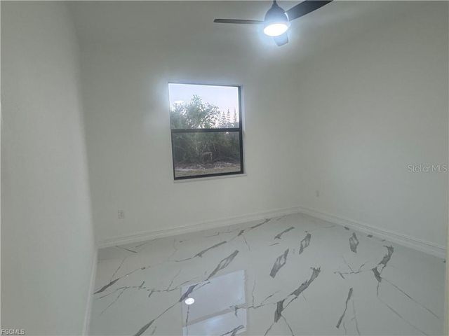 518 HARRY THAYER AVENUE S, Lehigh Acres, FL 33974