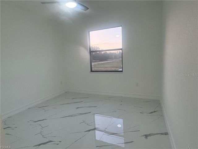 518 HARRY THAYER AVENUE S, Lehigh Acres, FL 33974