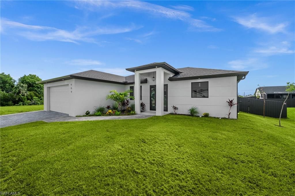 409 25TH PL, CAPE CORAL, FL 33993 — photo 3