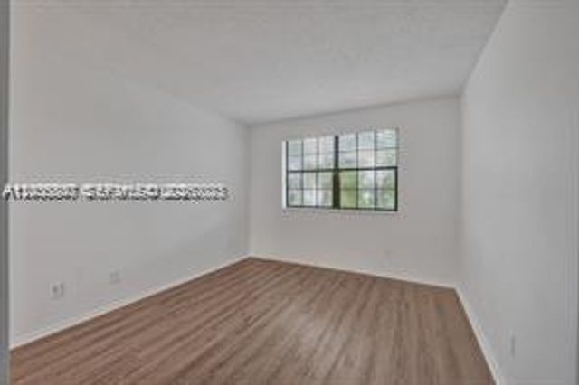 11241 W Atlantic Blvd 302, Coral Springs, FL 33071