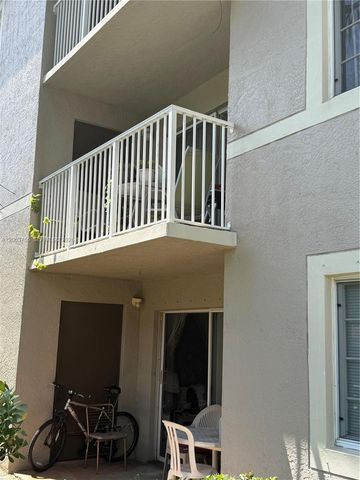 5045 Wiles Rd 201, Coconut Creek, FL 33073