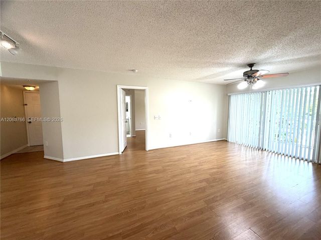 5045 Wiles Rd 201, Coconut Creek, FL 33073