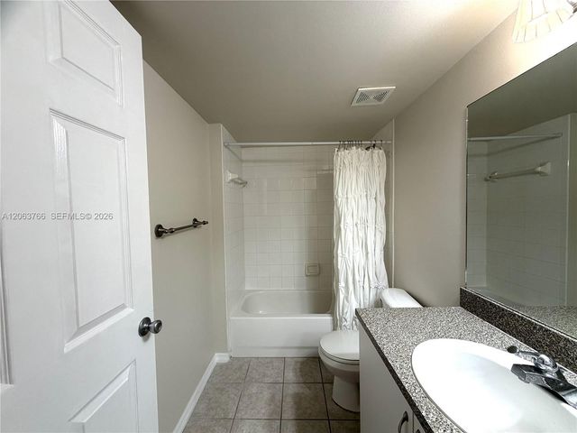 5045 Wiles Rd 201, Coconut Creek, FL 33073