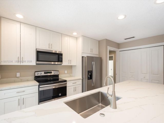 1404 Silverleaf Oak Court, Palm Beach Gardens, FL 33410