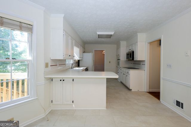 4128 Mayflower Court SW, Lilburn, GA 30047
