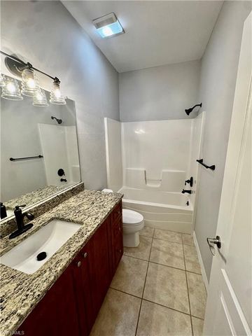 1709 Moore AVE, Lehigh Acres, FL 33972