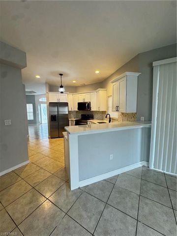 1709 Moore AVE, Lehigh Acres, FL 33972