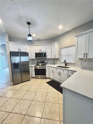 1709 Moore AVE, Lehigh Acres, FL 33972